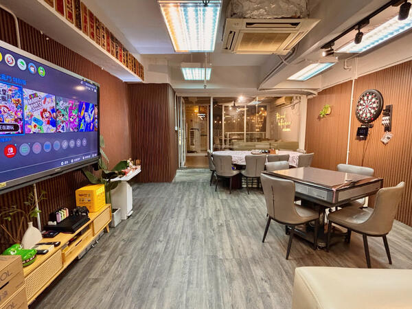 Entertainment hall with mahjong and large screen at ChillsVille Party Room in Lai Chi Kok, Kowloon. A spacious indoor area with mahjong, games, movies, and a large screen for group fun.